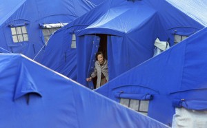 A woman is seen in a tent camp in L'Aquila April 7, 2009. (REUTERS/Alessandro Bianchi) A woman is seen in a tent camp in L'Aquila April 7, 2009. (©REUTERS/Alessandro Bianchi)